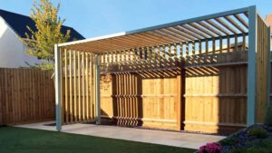 Bespoke garden pergola construction and decorative trellis installation