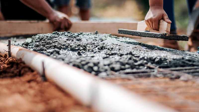 Hard landscaping project with paved patio and retaining walls