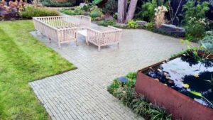 Residential garden pond design and tranquil water feature installation