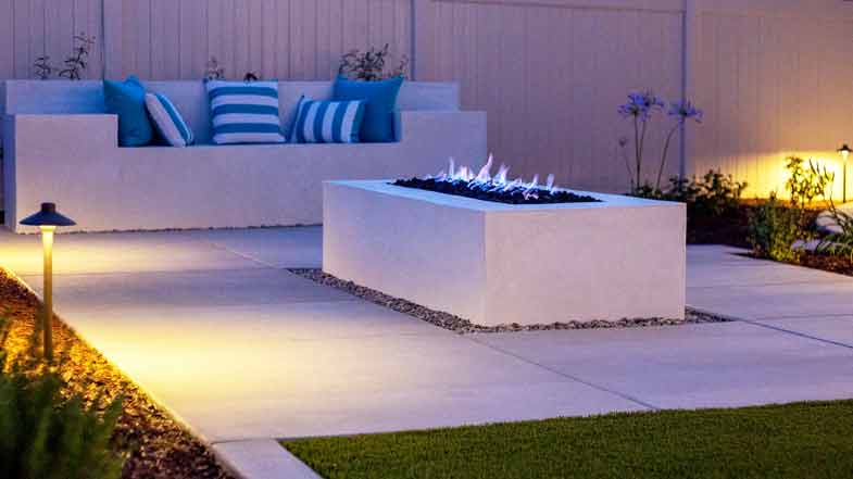 Hard landscaping project with paved patio and retaining walls